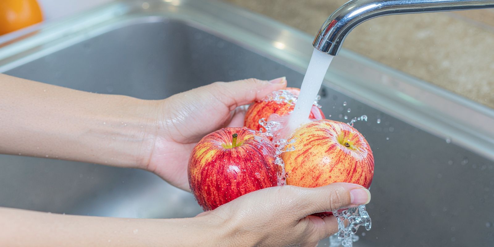 Washing apples - water billing banner image